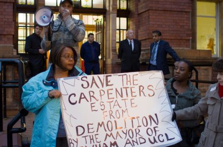 Carpenters residents protest outside Newham town hall, holding a banner which reads: "Save the Carpenters Estate from demolition by the Mayor of Newham and UCL".